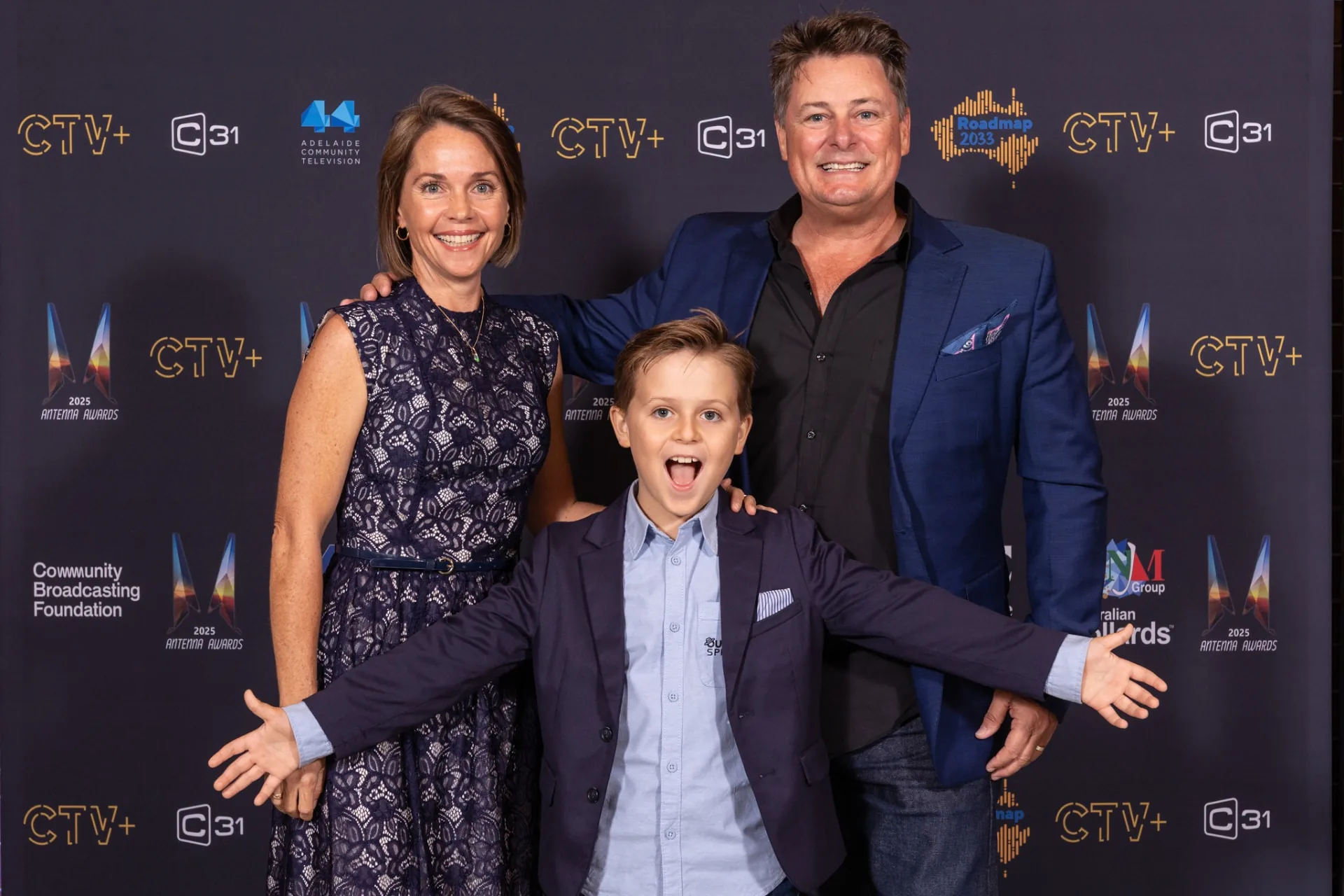 Katie, Paul and Jasper celebrating together at the Antenna Awards